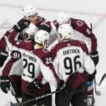 Colorado Avalanche players celebrate a goal against the Arizona Coyotes during first-period NHL Western Conference Stanley Cup playoff hockey game action in Edmonton, Alberta, Monday, Aug. 17, 2020. (Jason Franson/The Canadian Press via AP)