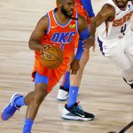 Oklahoma City Thunder's Chris Paul (3), left,  is pressured by Phoenix Suns' Jevon Carter during the second quarter of an NBA basketball game Monday, Aug. 10, 2020, in Lake Buena Vista, Fla. (Mike Ehrmann/Pool Photo via AP)