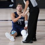 Dallas Mavericks guard Luka Doncic (77) comments to the referee during the first half of an NBA basketball game against the Phoenix Suns, Sunday, Aug. 2, 2020, in Lake Buena Vista, Fla. (AP Photo/Ashley Landis, Pool)