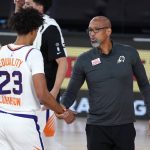Phoenix Suns head coach Monty Williams directs Phoenix Suns forward Cameron Johnson (23) during the first half of an NBA basketball game Tuesday, Aug. 11, 2020, in Lake Buena Vista, Fla. (AP Photo/Ashley Landis, Pool)