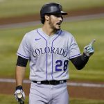 Colorado Rockies Nolan Arenado (28) argues a called third strike with the first base umpire during the seventh inning of a baseball game against the Arizona Diamondbacks, Wednesday, Aug. 26, 2020, in Phoenix. (AP Photo/Matt York)