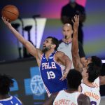 Philadelphia 76ers guard Raul Neto (19) goes up for a shot during the second half of an NBA basketball game against the Phoenix Suns Tuesday, Aug. 11, 2020, in Lake Buena Vista, Fla. (AP Photo/Ashley Landis, Pool)