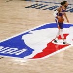 Phoenix Suns' Ricky Rubio dribbles down court against the Los Angeles Clippers during an NBA basketball game Tuesday, Aug. 4, 2020, in Lake Buena Vista, Fla. (Kevin C. Cox/Pool Photo via AP)