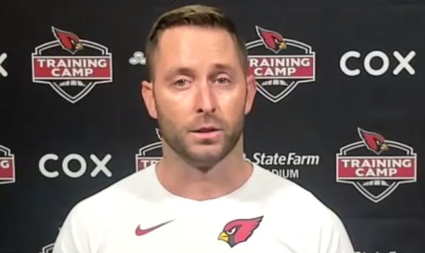 Kliff Kingsbury speaks to reporters after the Cardinals canceled practice Thursday to allow players...