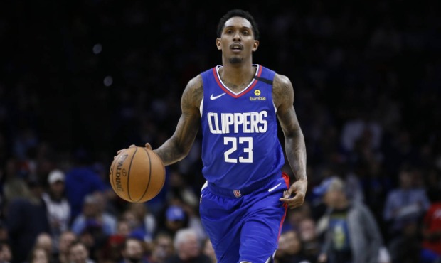In this Feb. 11, 2020, file photo, Los Angeles Clippers' Lou Williams brings the ball up during the...