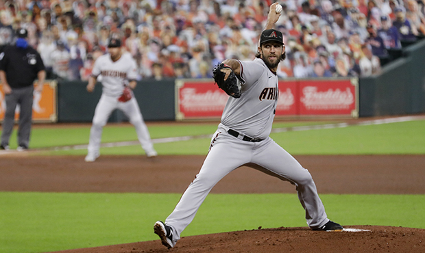 Madison Bumgarner #40 of the Arizona Diamondbacks pitches in the first inning against the Houston A...