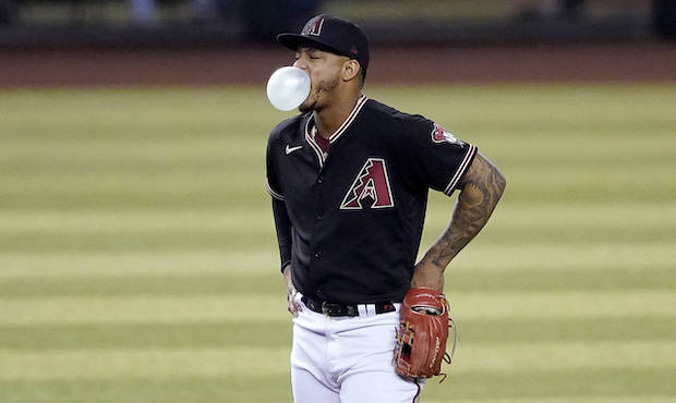 Arizona Diamondbacks' Ketel Marte waits for a pitch during the seventh inning of a baseball game ag...