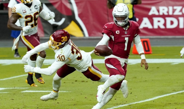 Arizona Cardinals quarterback Kyler Murray (1) runs for a touchdown as Washington Football Team fre...