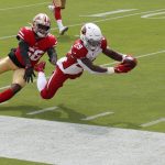 Arizona Cardinals running back Chase Edmonds (29) dives past San Francisco 49ers middle linebacker Kwon Alexander (56) to score a touchdown during the first half of an NFL football game in Santa Clara, Calif., Sunday, Sept. 13, 2020. (AP Photo/Josie Lepe)