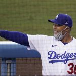 Los Angeles Dodgers manager Dave Roberts points in the dugout before the team's baseball game against the Arizona Diamondbacks on Wednesday, Sept. 2, 2020, in Los Angeles. (AP Photo/Marcio Jose Sanchez)