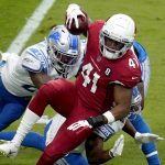 Arizona Cardinals running back Kenyan Drake (41) is hit during the first half of an NFL football game against the Detroit Lions, Sunday, Sept. 27, 2020, in Glendale, Ariz. (AP Photo/Ross D. Franklin)