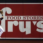 Arizona Diamondbacks centerfielder Daulton Varsho catches the ball against the wall against the Colorado Rockies during the fourth inning of a baseball game Sunday, Sept. 27, 2020, in Phoenix. (AP Photo/Darryl Webb)