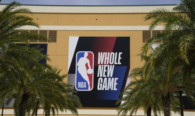 An NBA logo is displayed outside a basketball arena Friday, Aug. 28, 2020, in Lake Buena Vista, Fla...