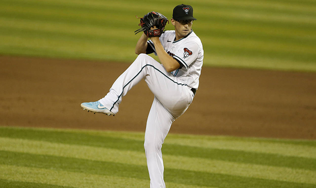 Arizona Diamondbacks' Taylor Widener delivers a pitch against the Oakland Athletics' during the eig...