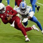 Arizona Cardinals quarterback Kyler Murray lunges for the end zone for a touchdown as Detroit Lions strong safety Duron Harmon (26) defends during the first half of an NFL football game, Sunday, Sept. 27, 2020, in Glendale, Ariz. (AP Photo/Rick Scuteri)
