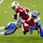 
              Arizona Cardinals running back Chase Edmonds (29) is hit by Detroit Lions defensive back Tracy Walker (21) andcornerback Jeff Okudah during the first half of an NFL football game, Sunday, Sept. 27, 2020, in Glendale, Ariz. (AP Photo/Rick Scuteri)
            