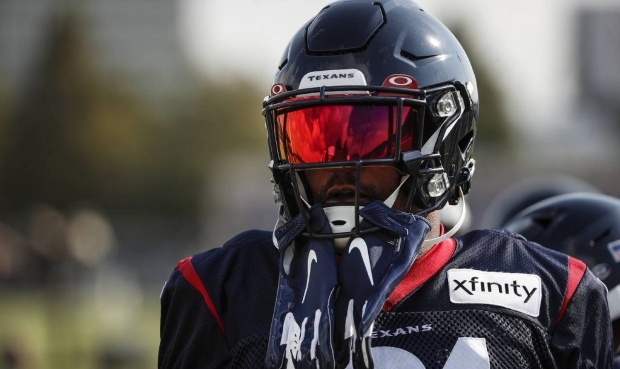 Houston Texans running back David Johnson gets ready for practice during an NFL training camp footb...