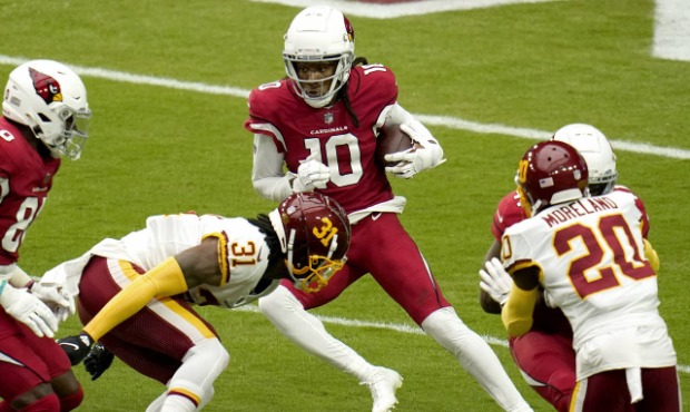 Arizona Cardinals wide receiver DeAndre Hopkins (10) tries to elude Washington Football Team safety...