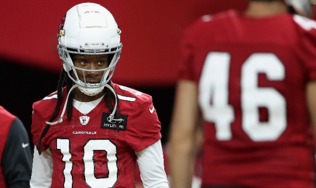 Wide receiver DeAndre Hopkins #10 of the Arizona Cardinals warms-up during a NFL team training camp...