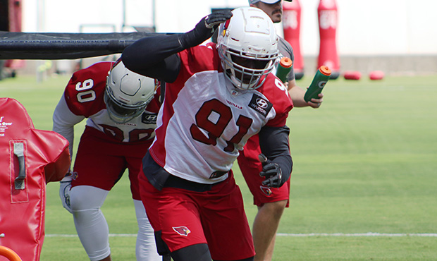 Arizona Cardinals DL Michael Dogbe goes through drills during the team’s practice Wednesday, Sept...