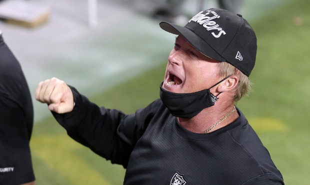 Las Vegas Raiders head coach Jon Gruden celebrates after defeating the New Orleans Saints in an NFL...