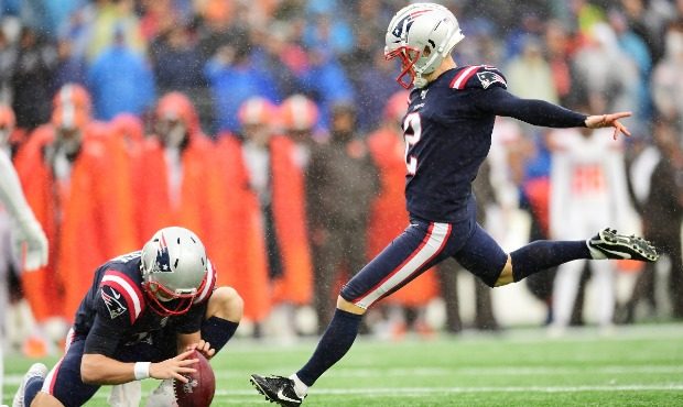 Kicker Mike Nugent #2 of the New England Patriots kicks a field goal in the first quarter of the ga...