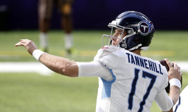 Tennessee Titans quarterback Ryan Tannehill (17) throws a pass during the first half of an NFL foot...