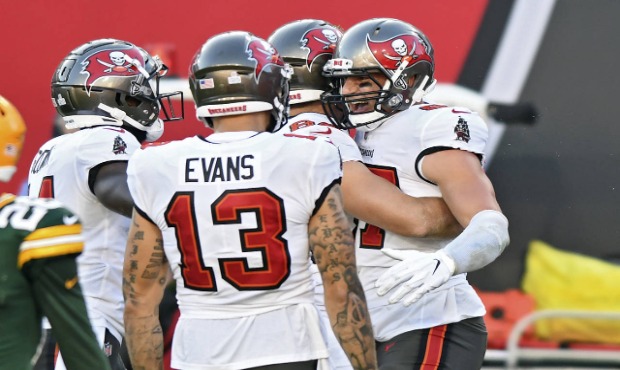 Tampa Bay Buccaneers tight end Rob Gronkowski (87) celebrates with teammates, including Mike Evans ...