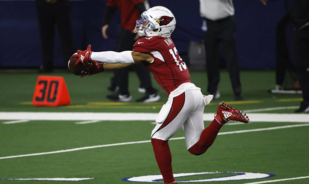 Arizona Cardinals wide receiver Christian Kirk (13) catches a long pass and runs it for a touchdown...