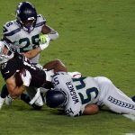 Arizona Cardinals wide receiver Andy Isabella (17) is hit by Seattle Seahawks middle linebacker Bobby Wagner (54) during the second half of an NFL football game, Sunday, Oct. 25, 2020, in Glendale, Ariz. (AP Photo/Ross D. Franklin)