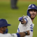 Los Angeles Dodgers' Cody Bellinger celebrates his two-run home run against the Tampa Bay Rays during the fourth inning in Game 1 of the baseball World Series Tuesday, Oct. 20, 2020, in Arlington, Texas. (AP Photo/Eric Gay)