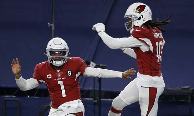 Arizona Cardinals' Kyler Murray (1) and DeAndre Hopkins (10) celebrate a touchdown scored on a carr...