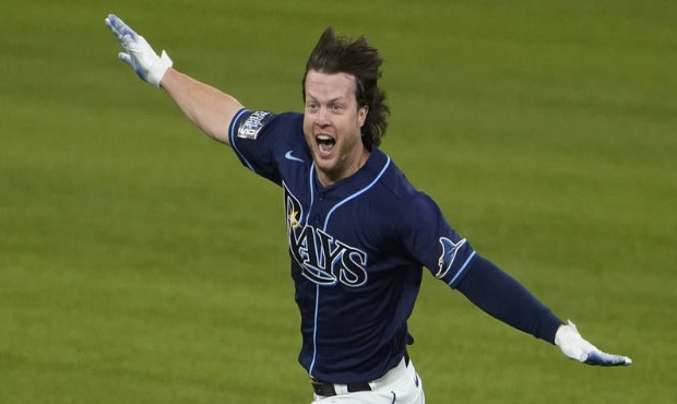 Tampa Bay Rays' Brett Phillips (14) celebrates the game winning hit against the Los Angeles Dodgers...