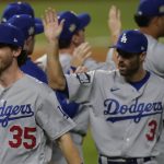 Los Angeles Dodgers center fielder Cody Bellinger celebrates their win against the Tampa Bay Rays in Game 3 of the baseball World Series Friday, Oct. 23, 2020, in Arlington, Texas. Dodgers beat the Rays 6-2 to lead the series 2-1 games. (AP Photo/Eric Gay)