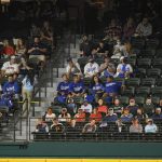 Fans watch during the fourth inning in Game 1 of the baseball World Series between the Los Angeles Dodgers and the Tampa Bay Rays Tuesday, Oct. 20, 2020, in Arlington, Texas. (AP Photo/Eric Gay)