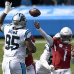 Arizona Cardinals quarterback Kyler Murray passes under pressure during the second half of an NFL football game against the Carolina Panthers Sunday, Oct. 4, 2020, in Charlotte, N.C. (AP Photo/Mike McCarn)