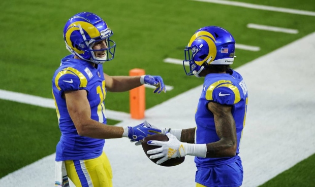 Los Angeles Rams wide receiver Josh Reynolds, right, celebrates his touchdown catch with Cooper Kup...