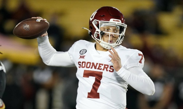 FILE - In this Saturday, Oct. 3, 2020, file photo, Oklahoma quarterback Spencer Rattler throws a pa...