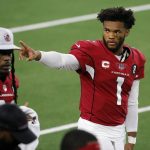 Arizona Cardinals' Kyler Murray (1) waves to fans in the stands in the first half of an NFL football game against the Dallas Cowboys in Arlington, Texas, Monday, Oct. 19, 2020. (AP Photo/Michael Ainsworth)