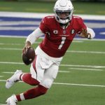 Arizona Cardinals quarterback Kyler Murray (1) carries the ball against the Dallas Cowboys in the first half of an NFL football game in Arlington, Texas, Monday, Oct. 19, 2020. (AP Photo/Michael Ainsworth)