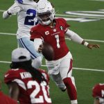 Arizona Cardinals' Kyler Murray (1) heads to the sideline as he carries the ball under pressure from Dallas Cowboys cornerback Trevon Diggs (27) in the first half of an NFL football game in Arlington, Texas, Monday, Oct. 19, 2020. (AP Photo/Michael Ainsworth)