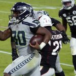 Seattle Seahawks running back Carlos Hyde (30) runs in for a touchdown against the Arizona Cardinals during the first half of an NFL football game, Sunday, Oct. 25, 2020, in Glendale, Ariz. (AP Photo/Rick Scuteri)