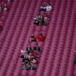 Arizona Cardinals and Seattle Seahawks fans watch during the first half of an NFL football game, Sunday, Oct. 25, 2020, in Glendale, Ariz. (AP Photo/Ross D. Franklin)