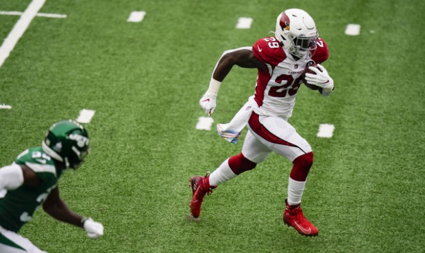 Arizona Cardinals running back Chase Edmonds, right, runs in for a touchdown during the first half ...