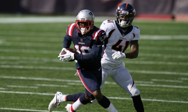 New England Patriots wide receiver Isaiah Zuber (19) runs from Denver Broncos cornerback De'Vante B...