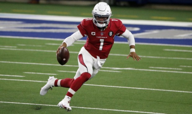 Arizona Cardinals quarterback Kyler Murray (1) carries the ball against the Dallas Cowboys in the f...