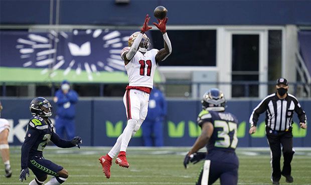 San Francisco 49ers wide receiver Brandon Aiyuk (11) makes a leaping catch against the Seattle Seah...