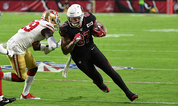 Maxx Williams #87 of the Arizona Cardinals runs with the ball after making a reception during the f...