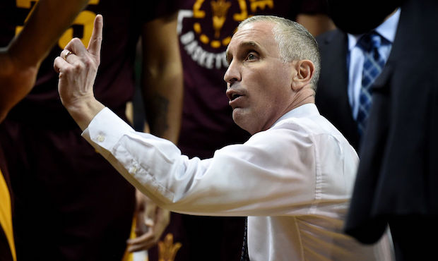 Head coach Bobby Hurley of the Arizona State Sun Devils speaks with his team during  the first half...