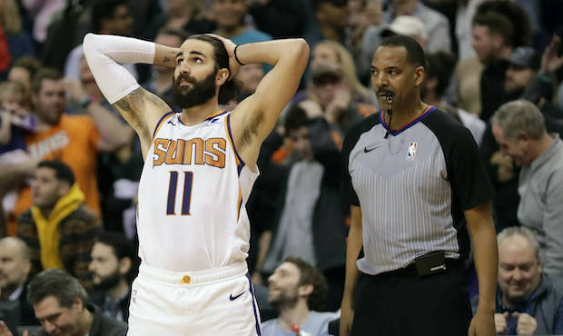 Phoenix Suns guard Ricky Rubio (11) looks at the scoreboard as time expires during the second half ...